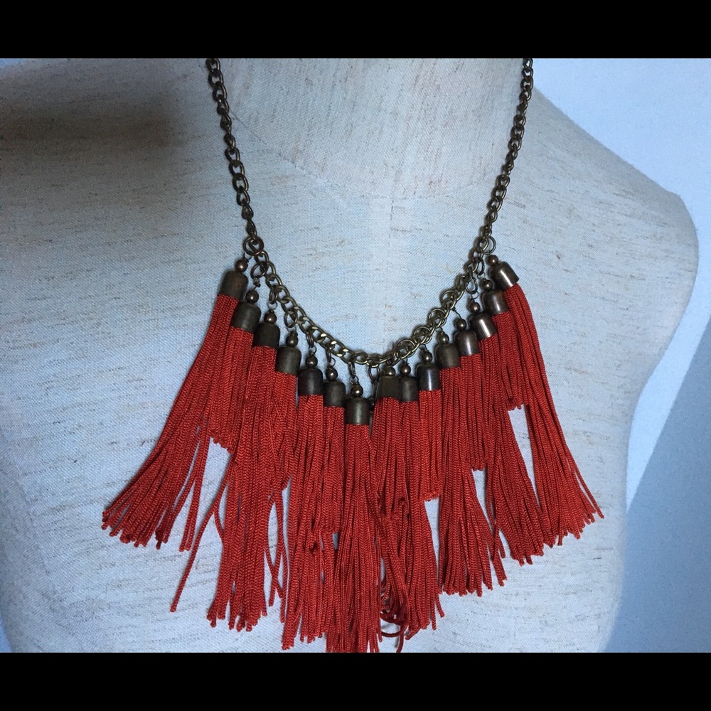 Statement necklace with red tassels